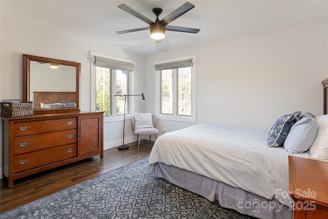 bedroom featuring dark wood-type flooring and ceiling fan