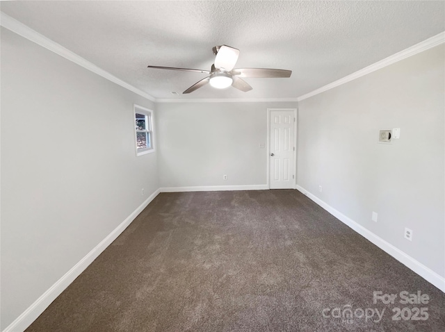 carpeted spare room with ceiling fan, ornamental molding, and a textured ceiling