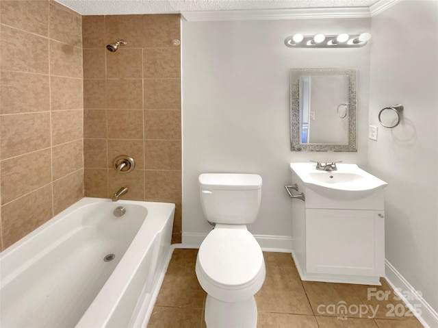 full bathroom featuring tile patterned flooring, vanity, ornamental molding, tiled shower / bath, and toilet