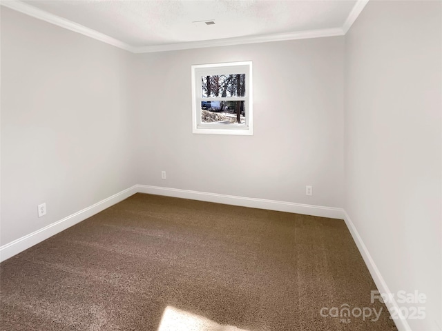 carpeted spare room with crown molding