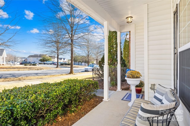 view of patio featuring a porch