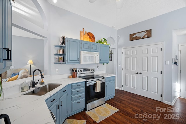 kitchen featuring blue cabinetry, sink, stainless steel range with electric cooktop, and dark hardwood / wood-style flooring