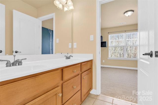 bathroom featuring vanity and tile patterned flooring