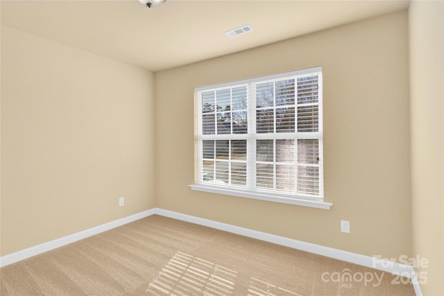 view of carpeted spare room