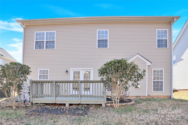 back of property featuring a deck