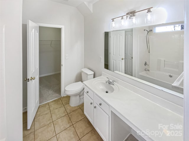 full bathroom featuring vanity, tub / shower combination, tile patterned floors, and toilet