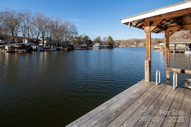 dock area featuring a water view