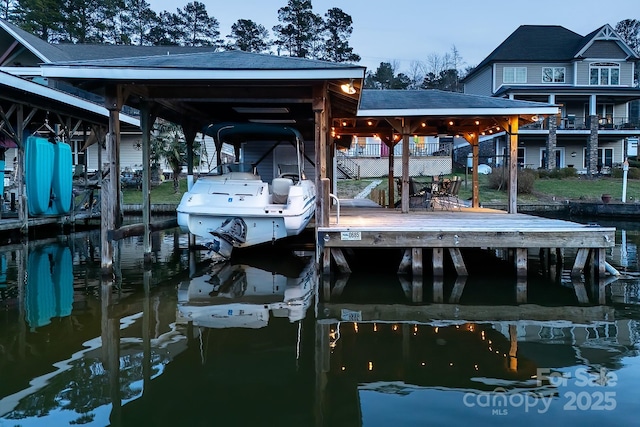 dock area with a water view