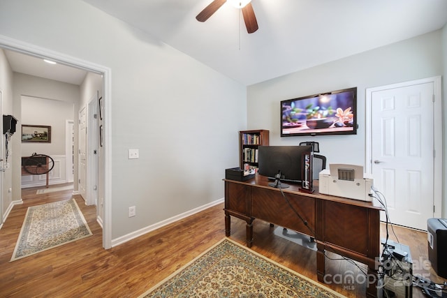 office featuring hardwood / wood-style floors and ceiling fan