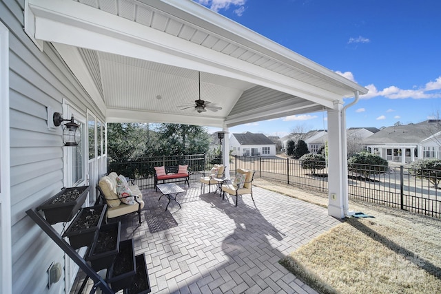 view of patio / terrace with an outdoor living space and ceiling fan