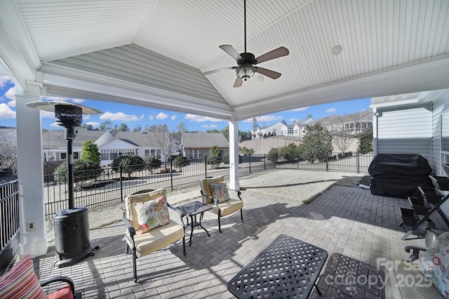 view of patio / terrace featuring ceiling fan