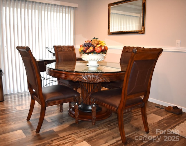 dining room featuring wood-type flooring