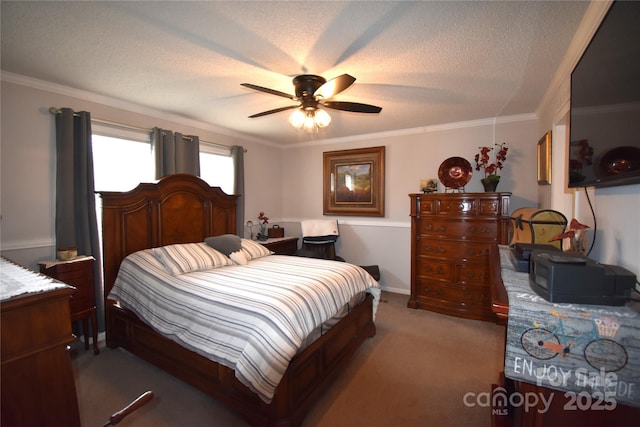 bedroom featuring ceiling fan, ornamental molding, carpet flooring, and a textured ceiling