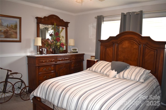 bedroom featuring crown molding and light colored carpet