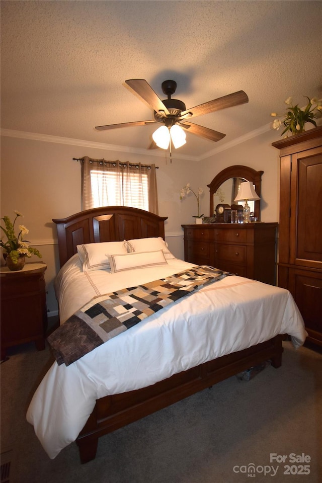 carpeted bedroom with crown molding, ceiling fan, and a textured ceiling