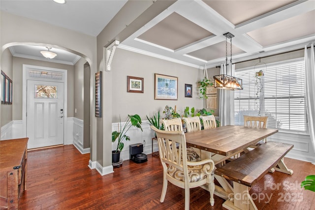 dining space featuring beamed ceiling, coffered ceiling, dark hardwood / wood-style floors, and ornamental molding