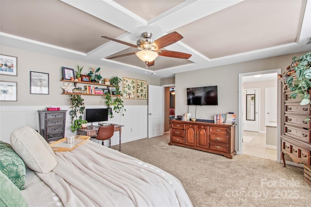 bedroom with ceiling fan, coffered ceiling, and light carpet