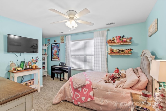 bedroom with light colored carpet and ceiling fan