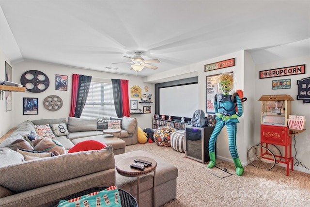 carpeted living room with lofted ceiling and ceiling fan