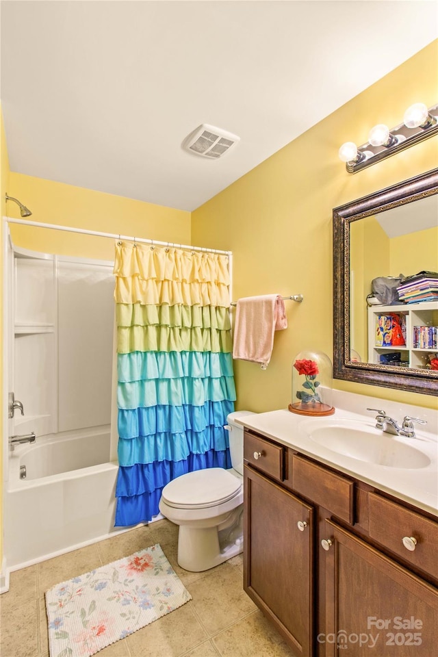 full bathroom with vanity, tile patterned floors, toilet, and shower / bath combo