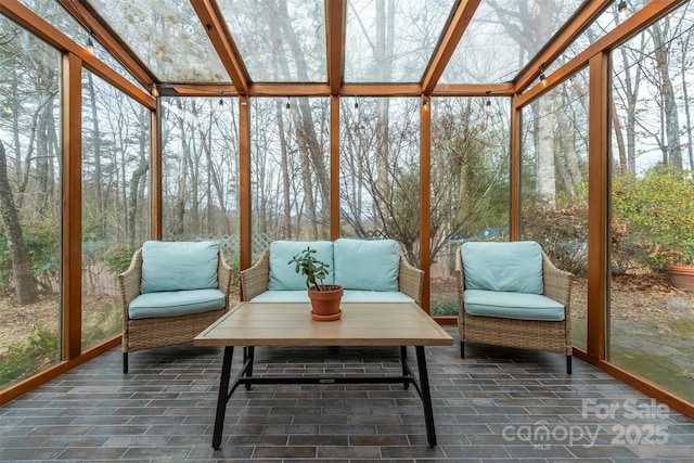 sunroom / solarium featuring plenty of natural light