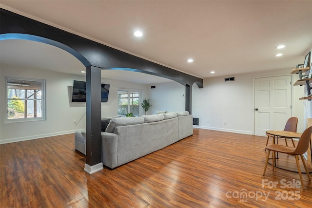 living room featuring dark hardwood / wood-style flooring