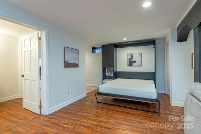 bedroom featuring hardwood / wood-style floors