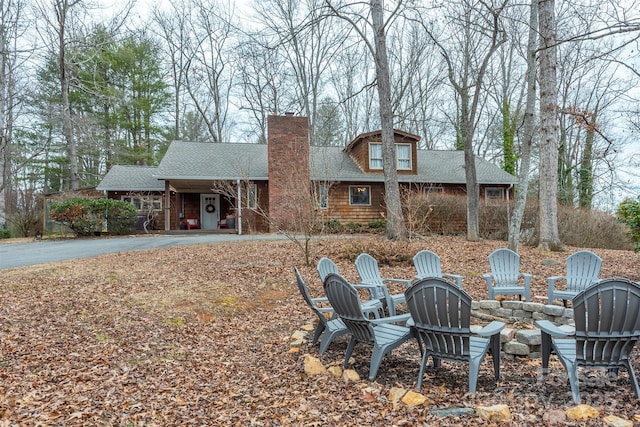 view of front facade with a fire pit