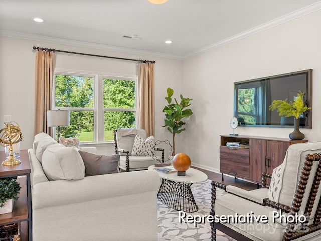 living room with ornamental molding and hardwood / wood-style floors