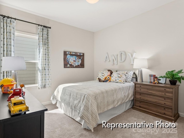 bedroom with light colored carpet