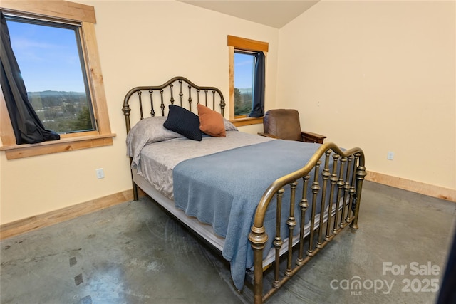 bedroom with vaulted ceiling