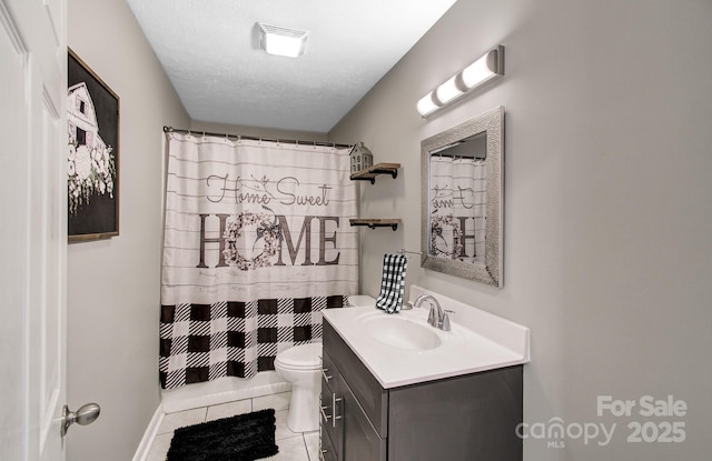 bathroom with walk in shower, tile patterned floors, vanity, and toilet