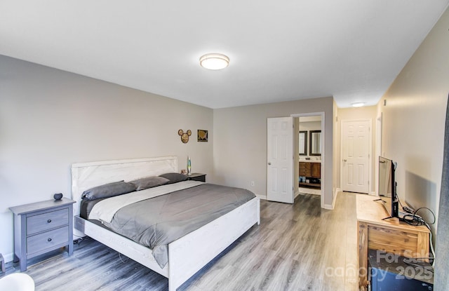 bedroom featuring light wood-type flooring