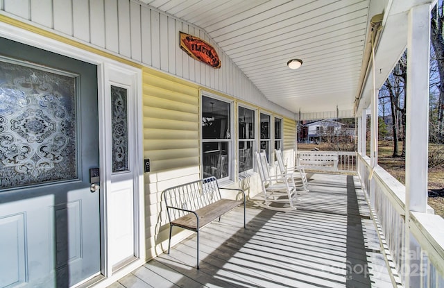 wooden terrace with covered porch