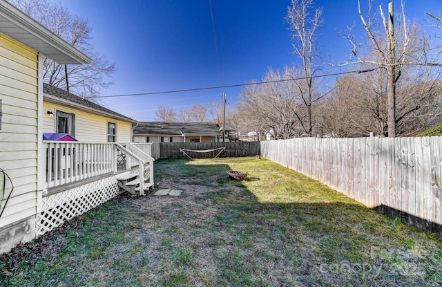 view of yard with a deck