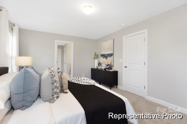 bedroom with light carpet