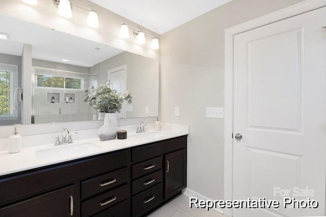 bathroom with vanity and tile patterned floors