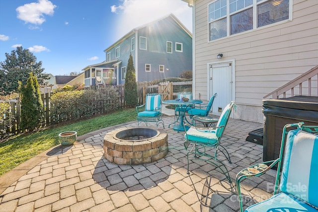 view of patio featuring a fire pit