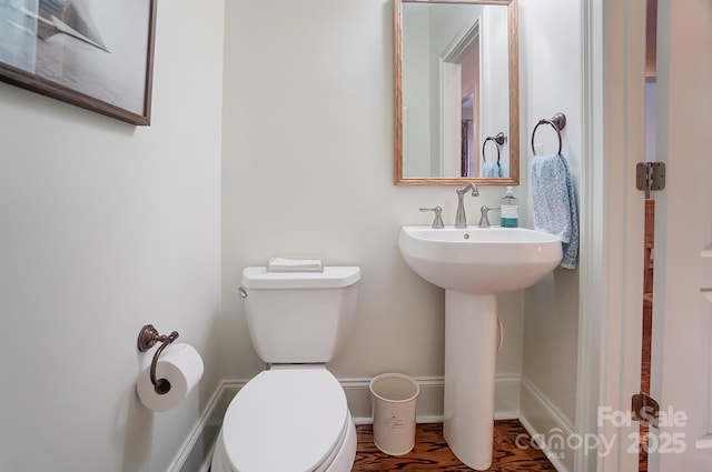 bathroom with sink and toilet