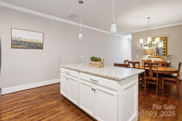 kitchen with white cabinetry, a center island, dark wood-type flooring, and pendant lighting