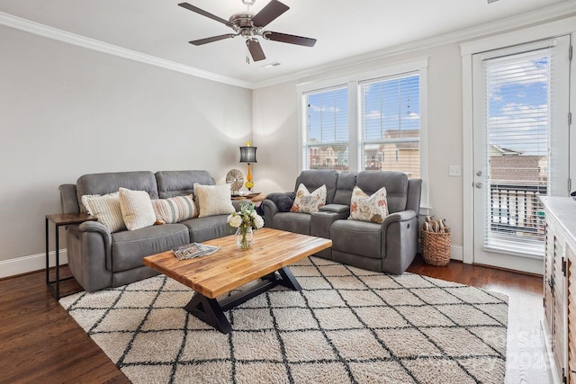 living room with crown molding, ceiling fan, and light hardwood / wood-style flooring