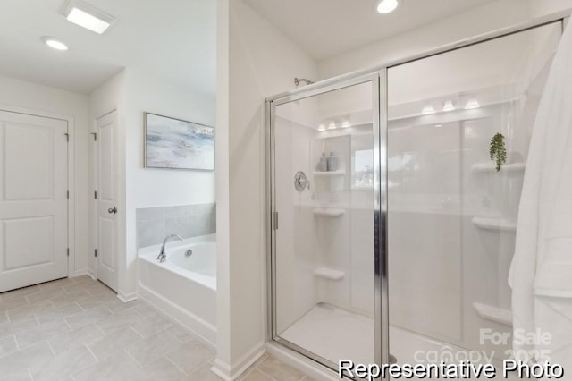 bathroom with independent shower and bath