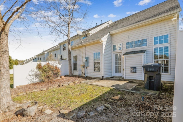 back of house with a patio area