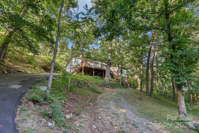 view of front of house with a wooden deck