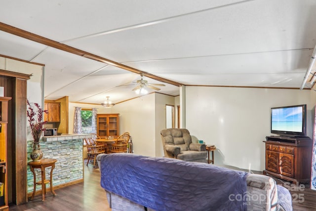 living room featuring dark wood-type flooring, lofted ceiling with beams, and ceiling fan