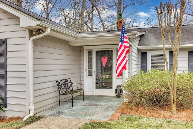 doorway to property featuring a patio area