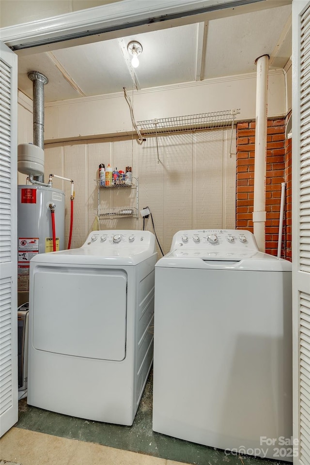 washroom with washer and dryer