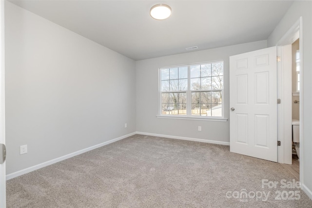 view of carpeted spare room