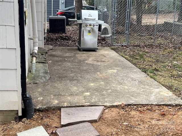 view of patio featuring grilling area and central air condition unit