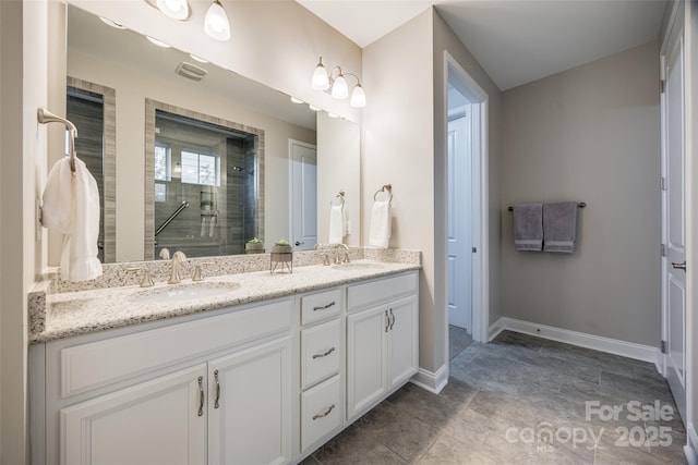 bathroom featuring vanity and walk in shower